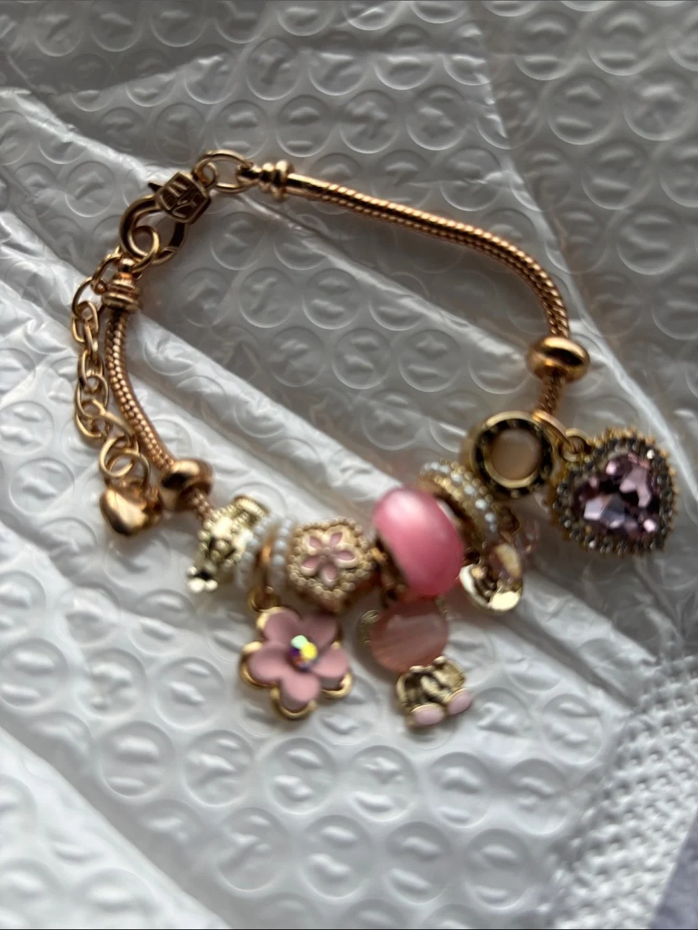 Gold-Tone Pink Charm Bracelet with Heart Pendant